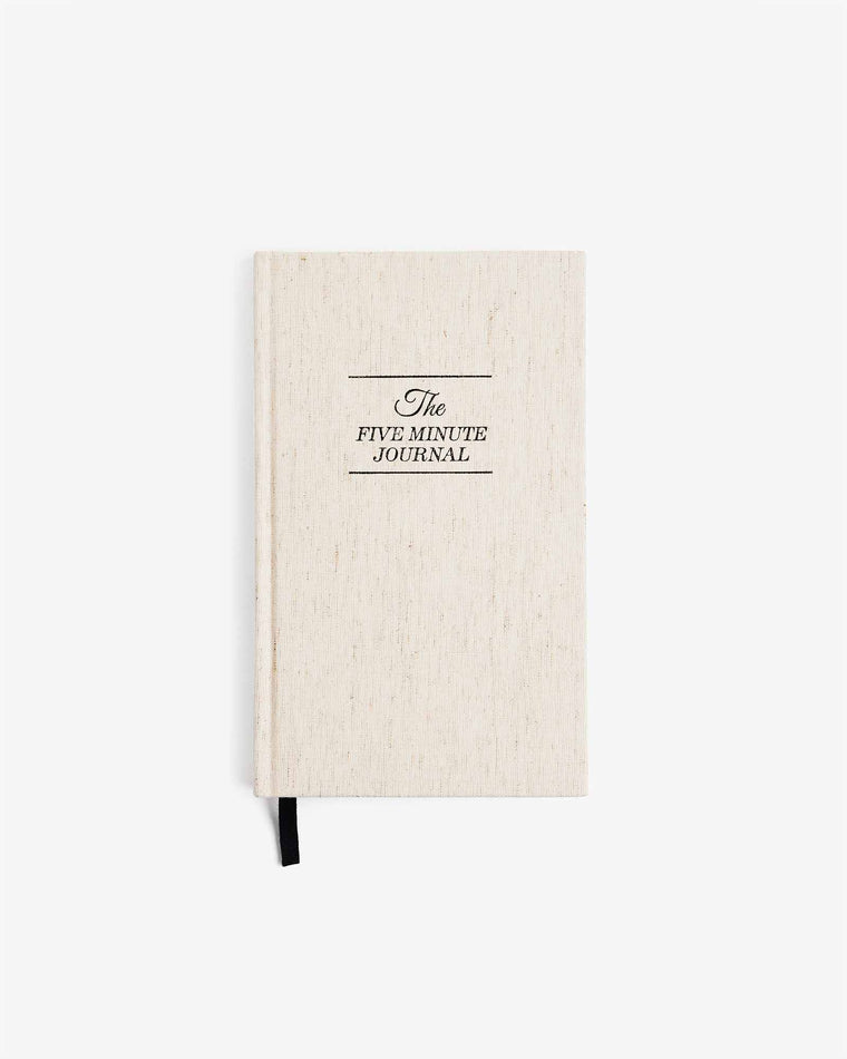 The Five Minute Journal in original linen with black ribbon bookmark.