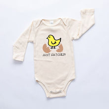 Natural cotton long-sleeve baby romper with a yellow chick and Just Hatched design