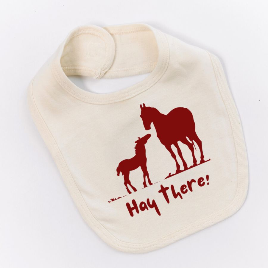 White bib with red horse and foal silhouettes and “Hay there!” text on a white background.