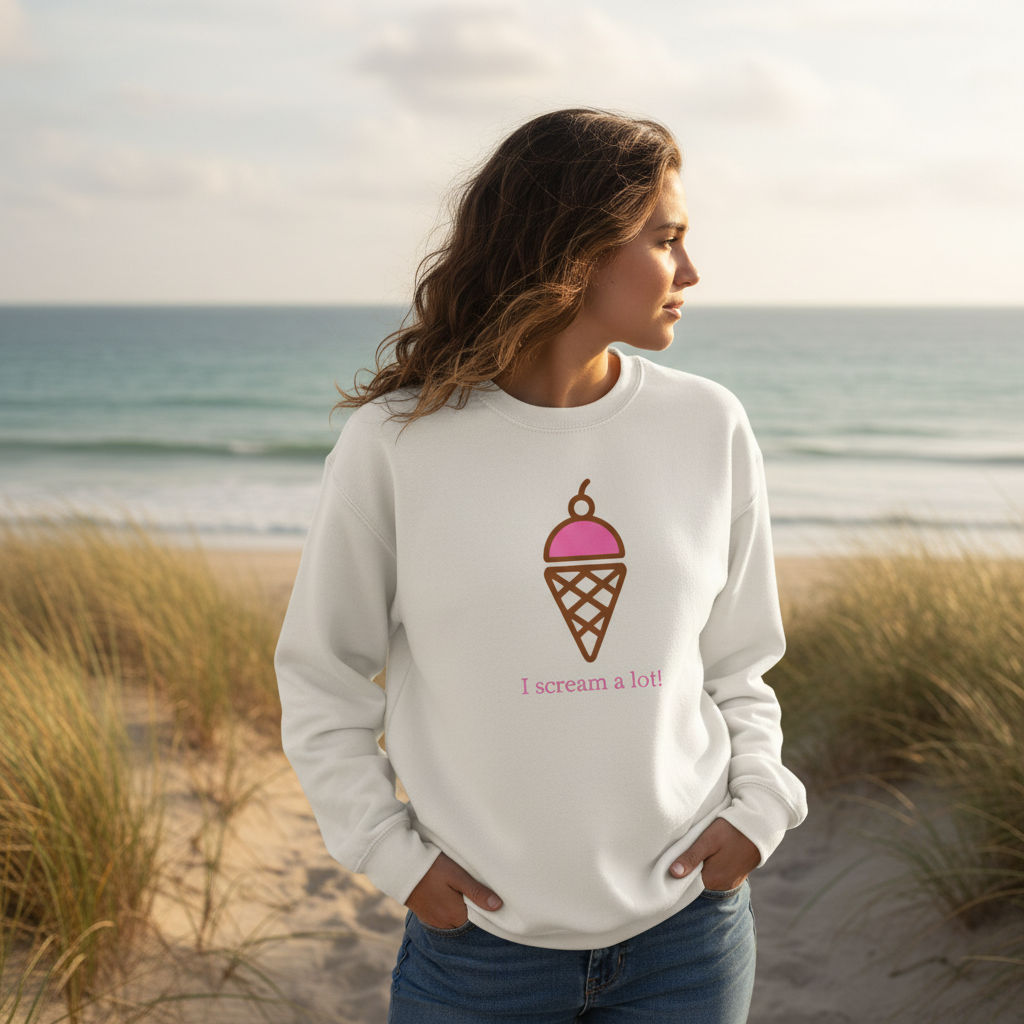 Woman wearing a natural cotton I Scream a Lot sweatshirt near the beach