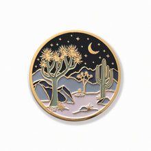 Round Moonlight Joshua Tree coaster with gold trim, crescent moon, stars, desert plants, and blue and lavender enamel