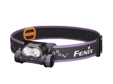Purple Fenix headlamp with black and purple headband on a transparent background.