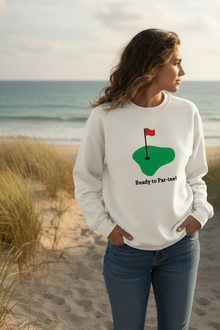 Woman wearing a natural cotton Ready to Par-tee golf sweatshirt near the beach