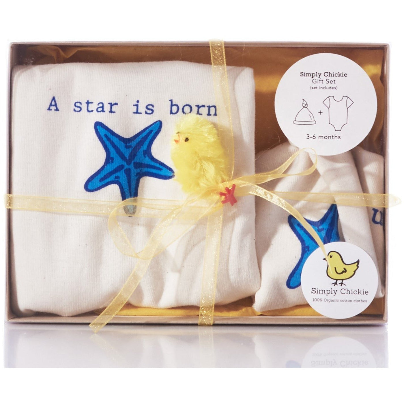 A Star Is Born natural cotton baby romper and hat gift set arranged in a clear gift box