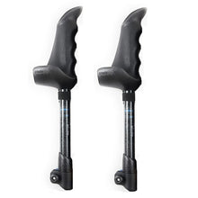 Pair of black contoured pole grips with patterned shafts on a white background.